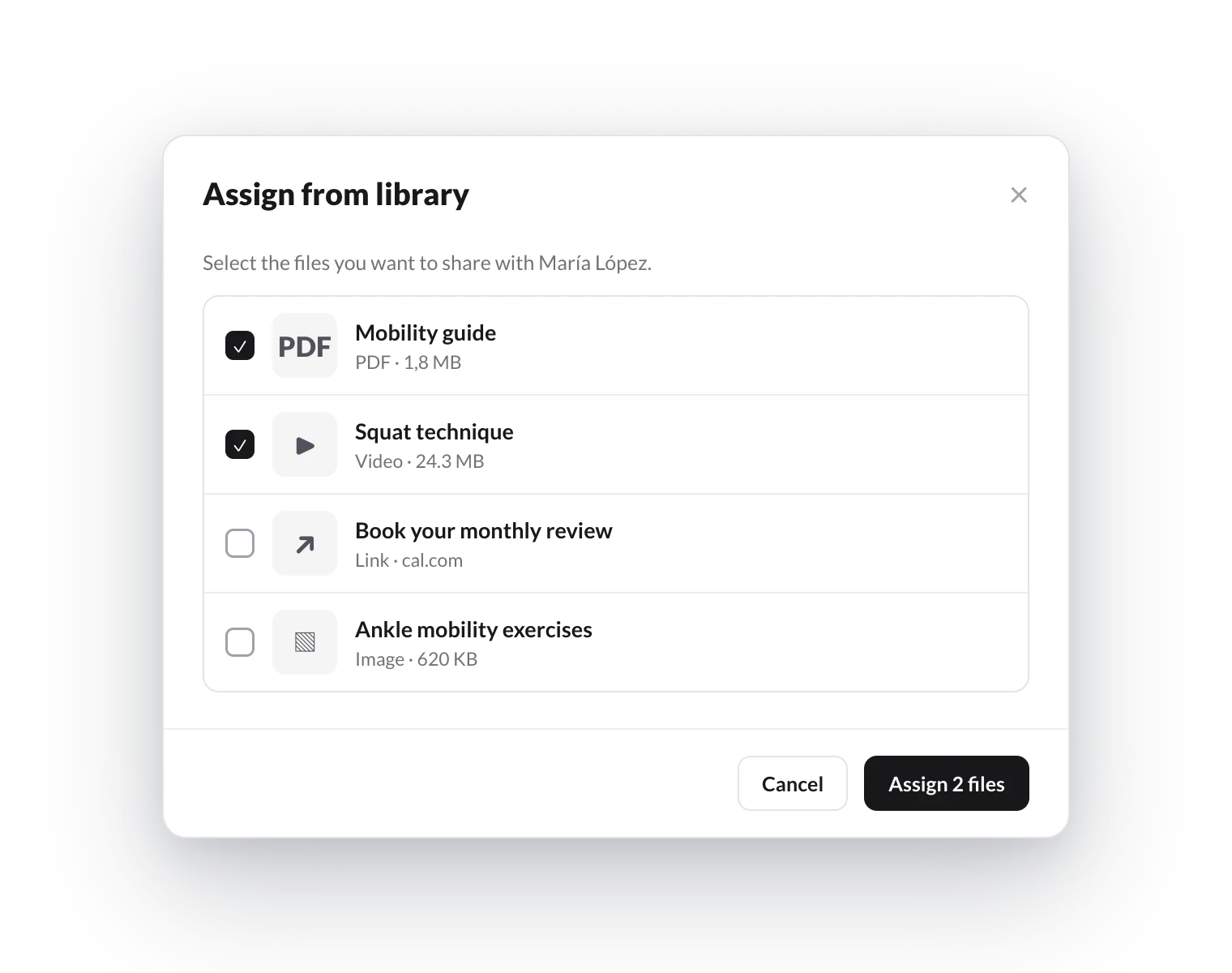 Assign from library dialog with two files selected to share with María López