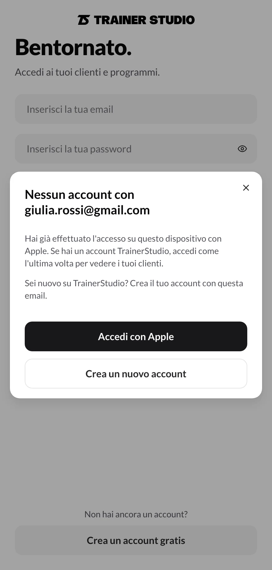 Finestra «Nessun account con giulia.rossi@gmail.com» che spiega che su questo dispositivo è già stato effettuato l'accesso con Apple, con i pulsanti «Accedi con Apple» e «Crea un nuovo account»
